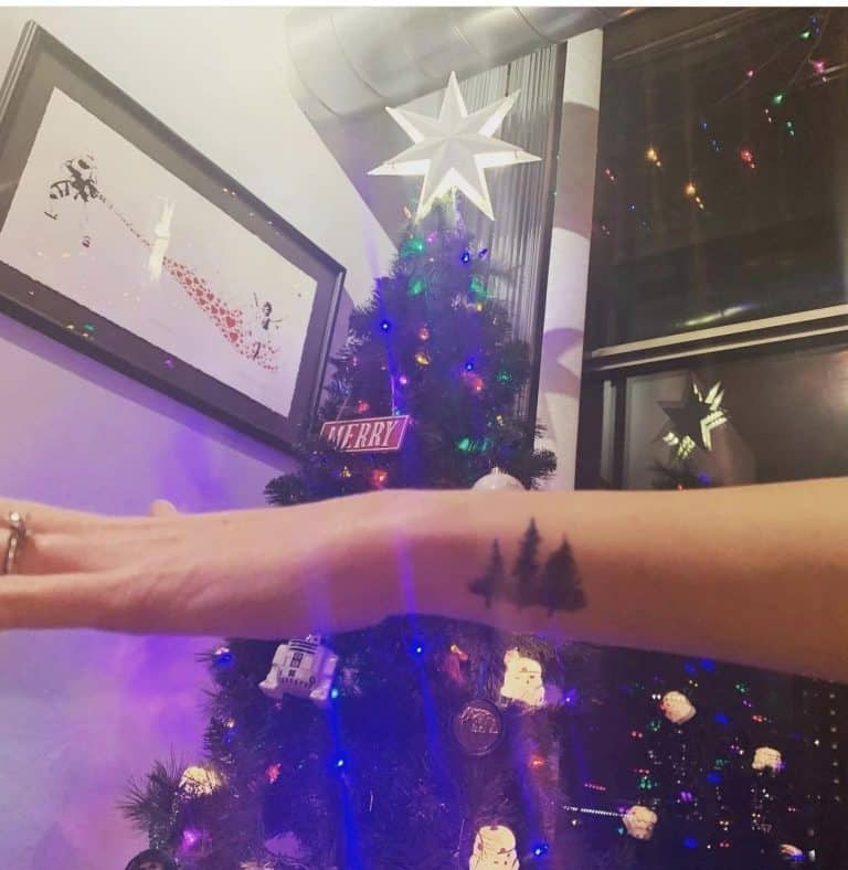 "I got that in honor of her in august of 2020. It represents a lot. Her 3 kids, the remaining 3 siblings, our old family vacation area that had 3 massive pines in front of it, and the book bond of Three Pines. It felt right" Caroline Kollar Murray